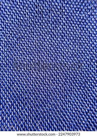 Macro Close-up of texture blue fabric cloth textile background