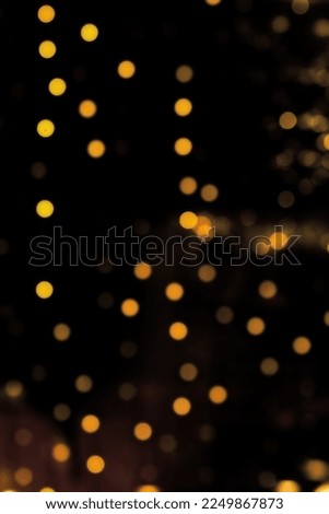 glitter vintage lights, bokeh background. Black and gold