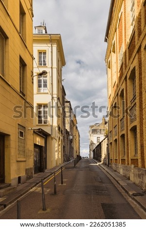 picture of a road in the old town of Dieppe, France, leading to the harbor