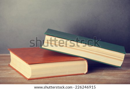 Aged books on a table.