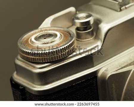 Close up of an old Shutter button of a film camera