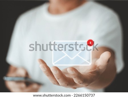 Hand showing Email concept. New email notification for business e-mail communication and digital marketing. Inbox receiving electronic message alert. Email marketing and Contact us by newsletter mail.