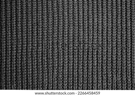 Abstract texture of bright solid color knitted surface.