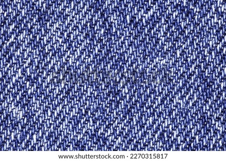 Denim, blue diagonal seams, close-up, background wallpaper, uniform texture pattern
