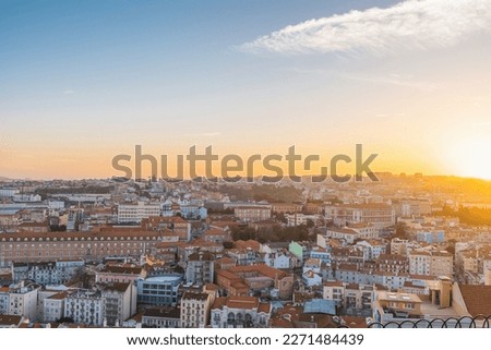 Lisbon, Portugal. Beautiful sunset aerial view of old town of Lisboa city. Summer vacation destination