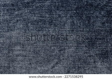 India, 7 March, 2023 : Blue jeans fabric background texture. Blue jeans fabric cloth textile material.