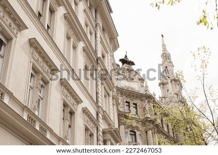 View on buildings in center of Budapest. Beige facade of a castle. Europe travel background.