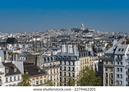 Above the roofs of Paris - city panorama towards montmartre