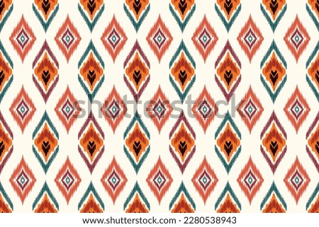Abstract Ethnic ikat  art. Seamless pattern in tribal, folk embroidery, and Mexican style. Aztec geometric art ornament print.Design for carpet, cover.wallpaper, wrapping, fabric, clothing