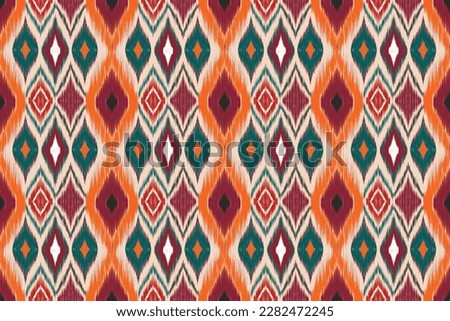 Pop ikat Abstract Ethnic art. Seamless pattern in tribal, folk embroidery, and Mexican style. Aztec geometric art ornament print.Design for carpet, cover.wallpaper, wrapping, fabric, clothing
