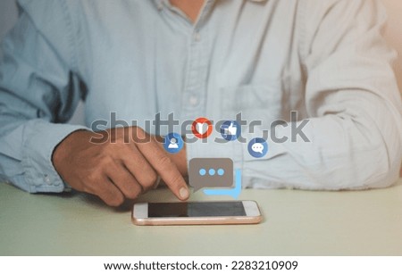 Social media and digital online concept, man using smart phone.The concept of living on vacation and playing social media. Social Distancing ,Working From Home concept.
