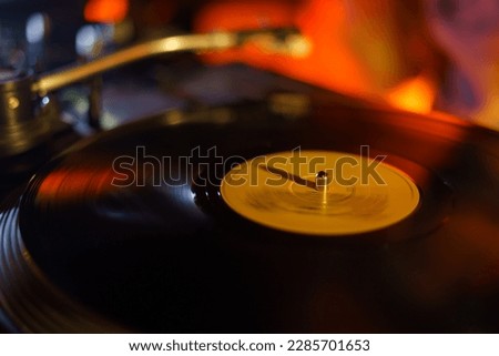Vinyl record being played on a gramophone