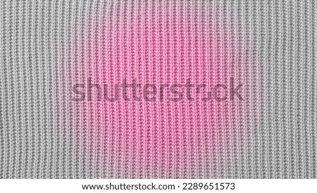 Pink Wool background from a textile material with Grey Vignette, closeup