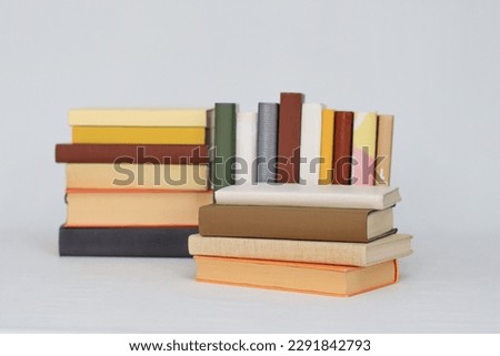 Pile of books on white background