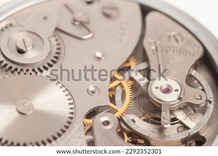 Mechanism, clockwork of a watch close-up. Vintage luxury background. Time, work concept.