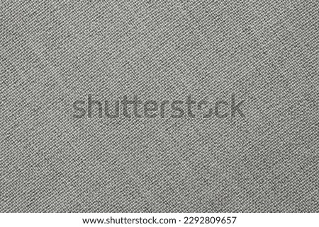 gray fabric texture from natural linen fibers as a background