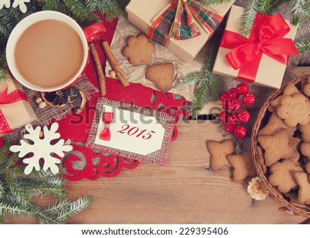 Gingerbread cookies and cup of coffee with christmas decoration