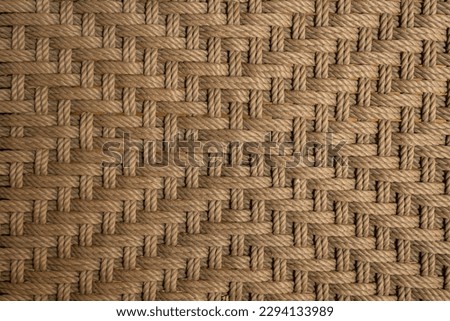 Old rope weave texture background. Grunge and dirty brown rope texture background.