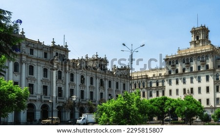 shot of historical colonial style buildings surrounding the Plaza San Martin in Lima, Peru