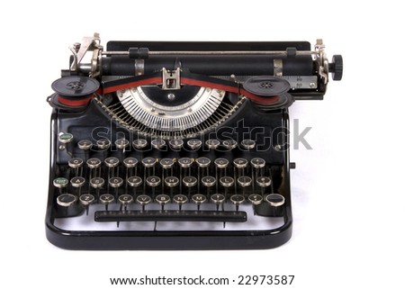 Old typewriter on isolated background