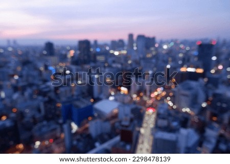 Amazing blurred panoramic view of Osaka city Japan skyline and skyscraper at sunset.
