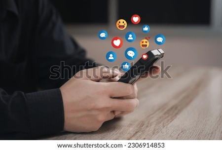 digital social media online concept : business man using his mobile or smart phone for chat , order his work or playing social media while he was resting.	
