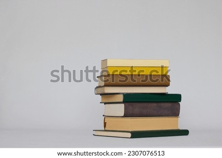 Stack of books and other materials for education, reading book or magazine, top view, isolated on white
