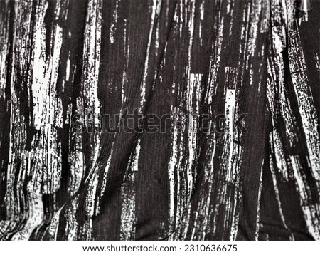 piece of black and white fabric texture