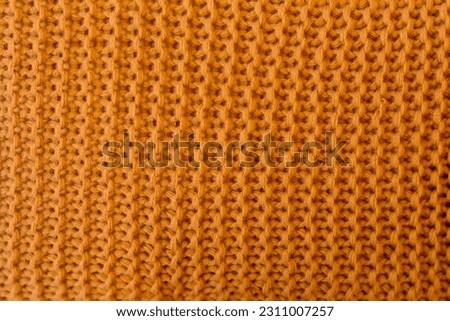 Closeup od brown knitted material 