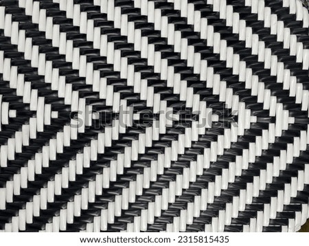 Hand-knitted black and white faux rattan panels