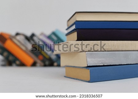 Folded books on a white background