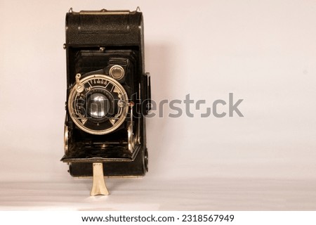 Very old camera with white background