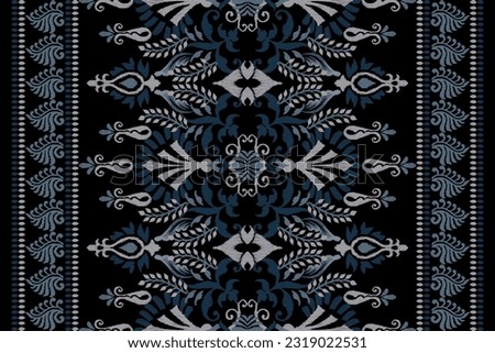 Ikat floral paisley embroidery on black background.Ikat ethnic oriental pattern traditional.Aztec style abstract vector illustration.design for texture,fabric,clothing,wrapping,decoration,scarf,carpet