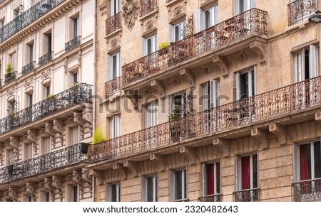 Facades of Haussmannian buildings in Paris in France