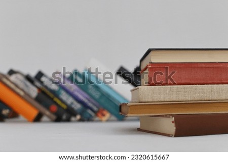 Folded books on a white background
