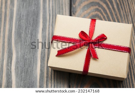 vintage gift box package  on old wooden background