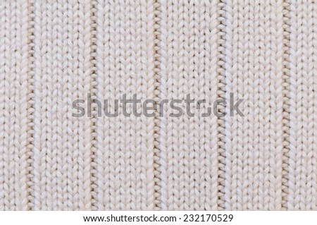 Ivory knitted cotton texture with vertical lines