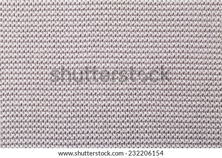 close-up of grey knitted fabric background texture