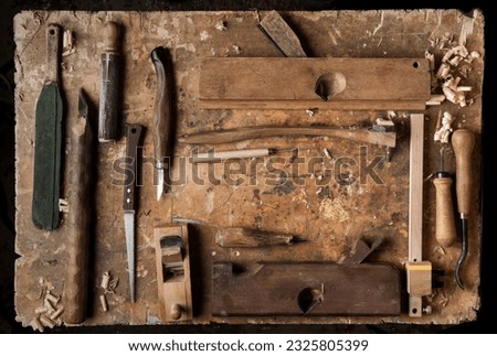 Hand tools Wood (Drill Jig Saw plane chisel) on an old wooden workbench