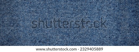 Blue Denim banner background. Stone washed cloth jeans texture. Trendy tailor denim Sample. Denim swatch for tailoring. fragments of jeans cloth.