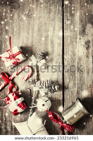 Jingle bells ,Christmas gifts and with candy canes over rusty background/ christmas holidays background