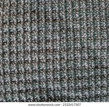 Jembrana Bali,A photo of a cloth fiber with a slightly silver color