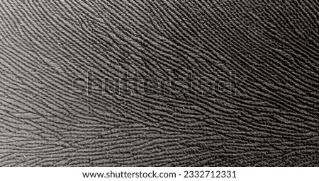 Background texture of fabric textile with stripes pattern and wave pattern, grey color, artistic.