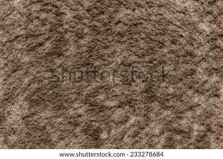 soft fluffy texture of pure fur fabric of brown color for empty backgrounds