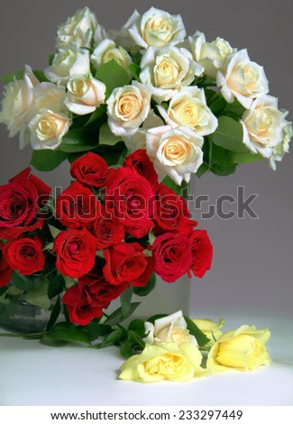 Composition of red, white and yellow roses.