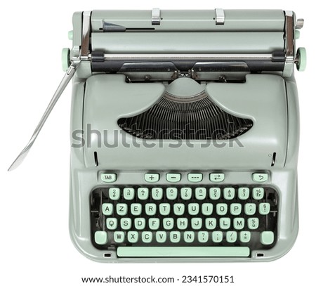 Retro vintage green typewriter isolated on white background. Top view