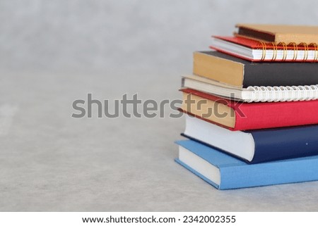 Books on gray background school education library