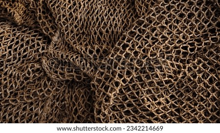 stacked rustic fishing net as background