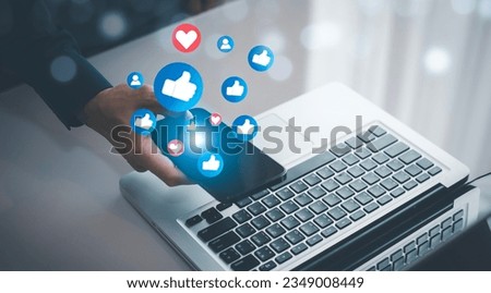Hand holding smartphone and Social media and digital online concept, smart phone with Social media, concept of living on vacation and playing social media. Social Distancing