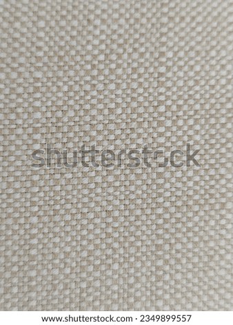 Macro photography of a fabric, with weaves and threads of different sizes intertwining. Crafts, tablecloth, macro photography, wallpaper, screensaver